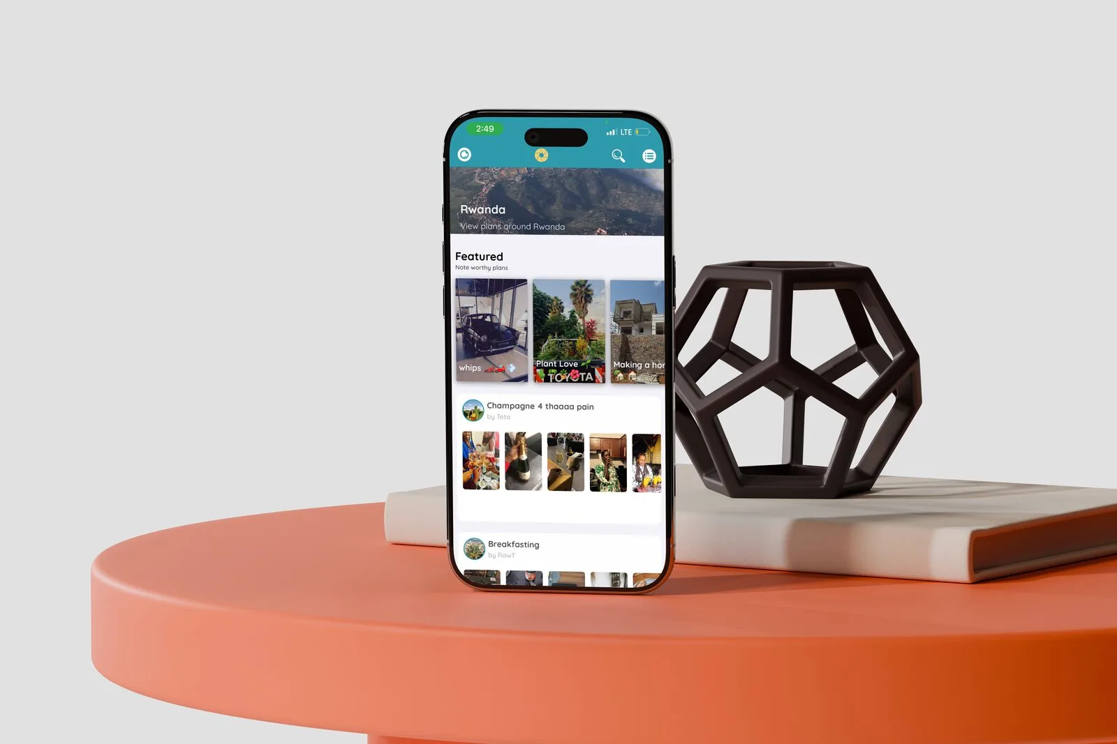 Happening app showing the Rwanda home screen with featured plans